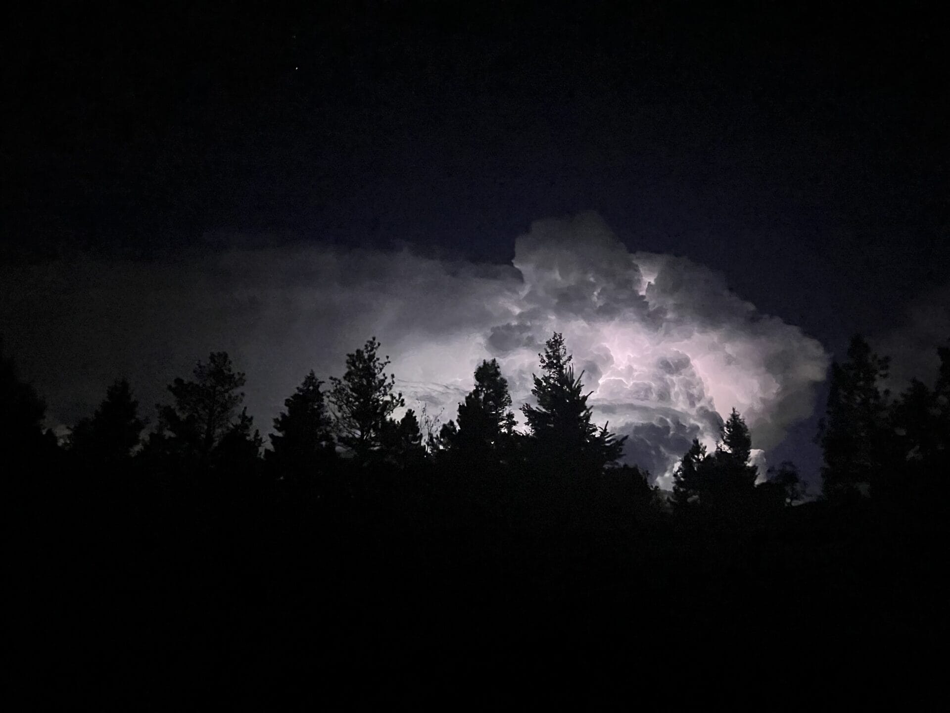photo of a thundercloud on a dark night