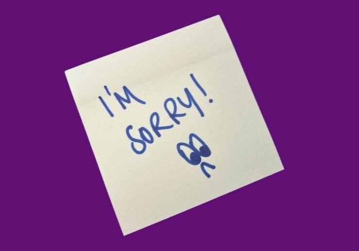 image of a yellow square postit note on a purple background. On the postit note is written 'I'm sorry!' with a sad face