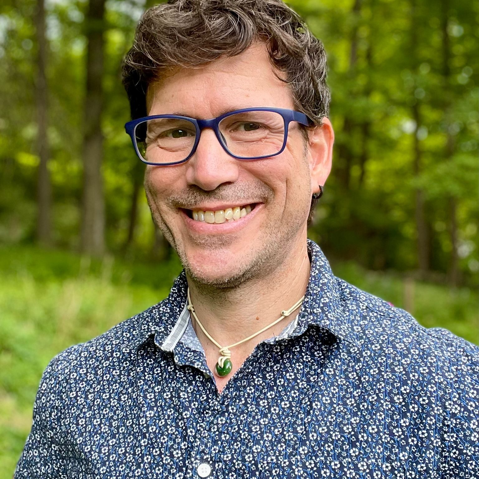 jose acevedo skyeteam picture of jose acevedo of SkyeTeamwearing a blue shirt standing outside